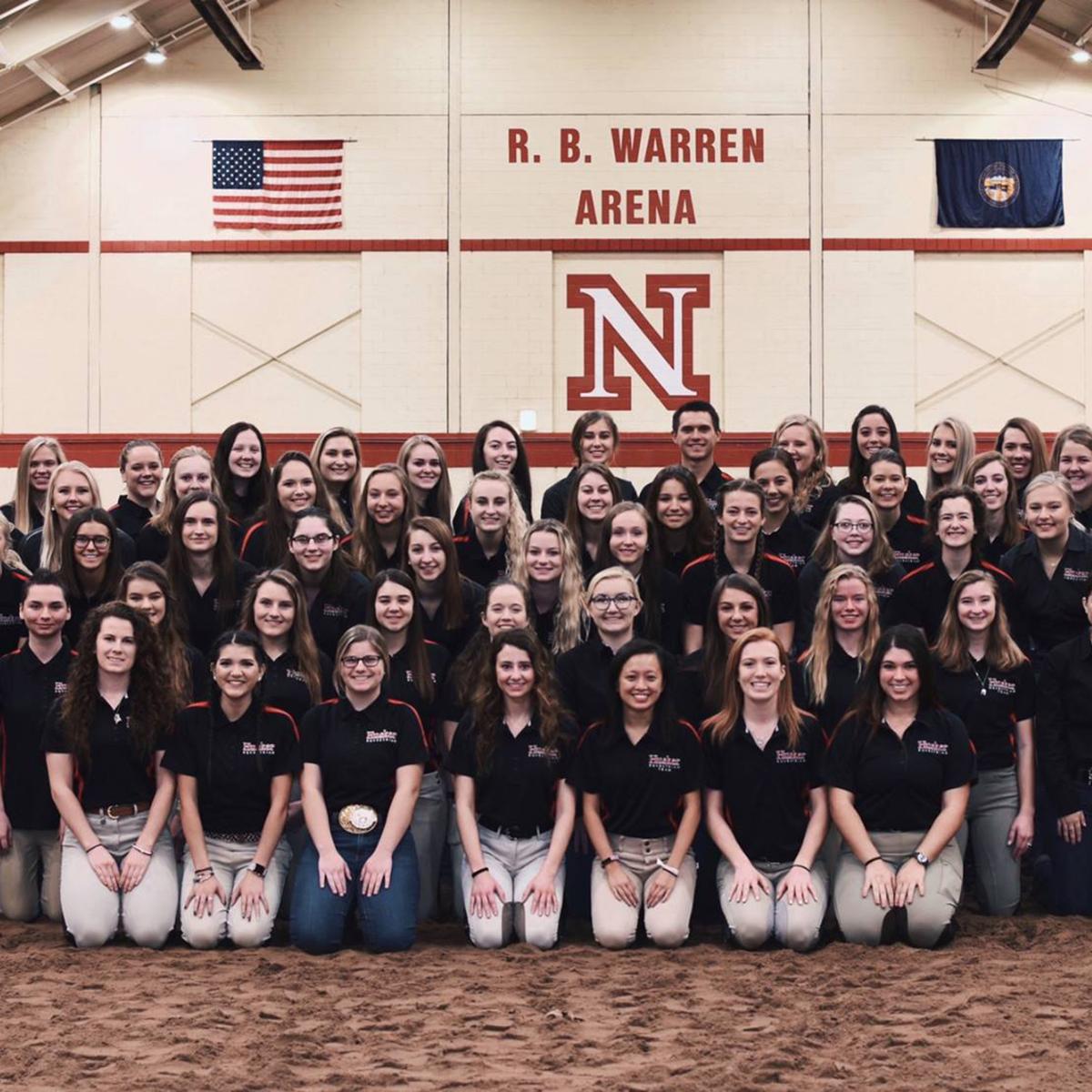 Equestrian team posing for a
                                            picture