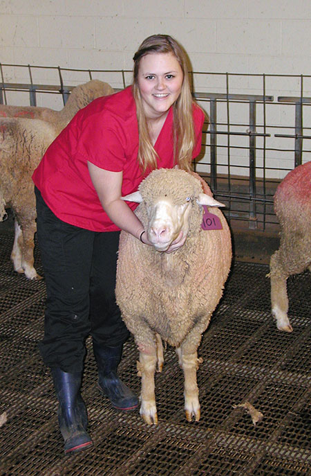 Caitlin Cadaret with sheep