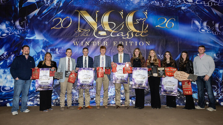2026 Livestock Judging Team holding award banners at 2026 Nebraska Cattlemens Classic