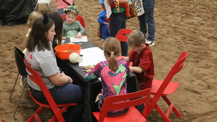 Children participating in a craft activity at the 2024 Boo at the U