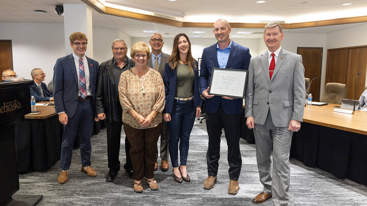 L to R: University of Nebraska student regent, Paul Pechous, Stanley and Peggy Johnson, Mike Boehm; Harlan Vice-chancellor for IANR, Lacy Johnson, Brent Johnson, and Ted Carter; president of the University of Nebraska System.