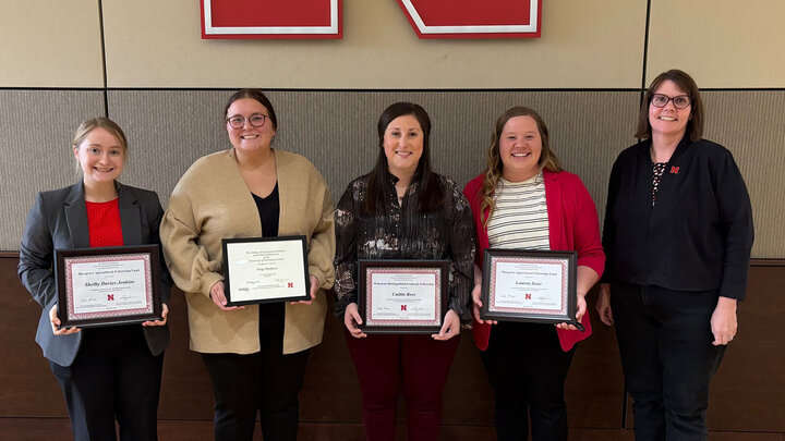 2024-25 Distinguished Fellowship and Award recipients (L-R): Shelby Davis-Jenkins, Paige Madison, Caitlin Ross, and Lauren Seier, pictured with Department Head Deb VanOverbeke.