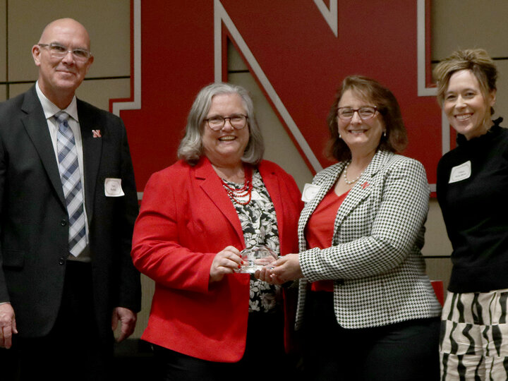 Deb Hamernik receiving her 2023 Alumni award