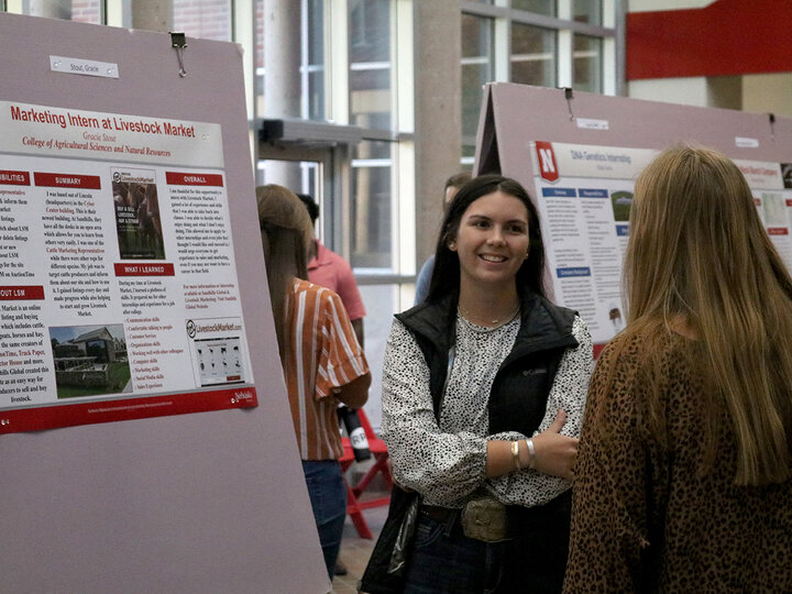 two students discussing an internship experience