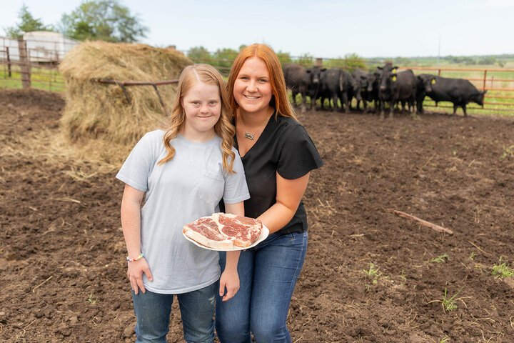 Claire Bruns (left) and Allison Walbrecht are co-founders of Unified Agriculture, a direct-to-consumer beef-sales enterprise creating ag-focused employment opportunities for those with disabilities. Many of the showmen in the Unified Showing 4-H Club have developed a passion for livestock raising and care, and it’s important for the ag sector “to let them in the door,” Walbrecht said.
