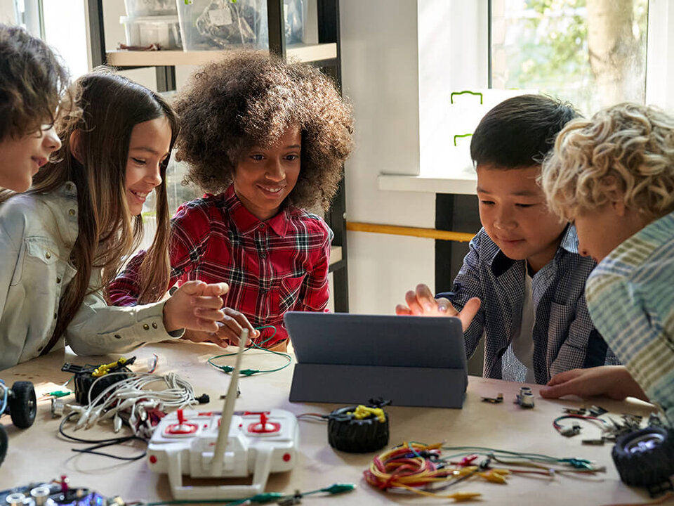 children playing with robots